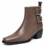 bottines femme en cuir a boucle doublure cuir marron doublure cuir vue de trois quarts sur fond blanc 45126