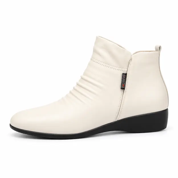 bottines femme en cuir fourrees compensees colorees beige fourre vue de profil sur fond blanc 45083