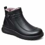 Bottines femmes noires avec bouton décoratif et fermeture éclair élégante