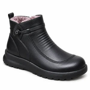 Bottines femmes noires avec bouton décoratif et fermeture éclair élégante