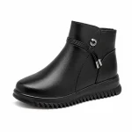 Bottines femme noires avec bride décorative et fermeture éclair élégantes