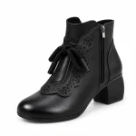 Bottines femme noires à nœud avec talon carré et zip élégant