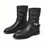 Bottines femme noires à tige texturée et bride élégante