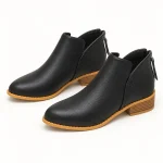 Bottines femme noires à zip arrière et col échancré en cuir élégant