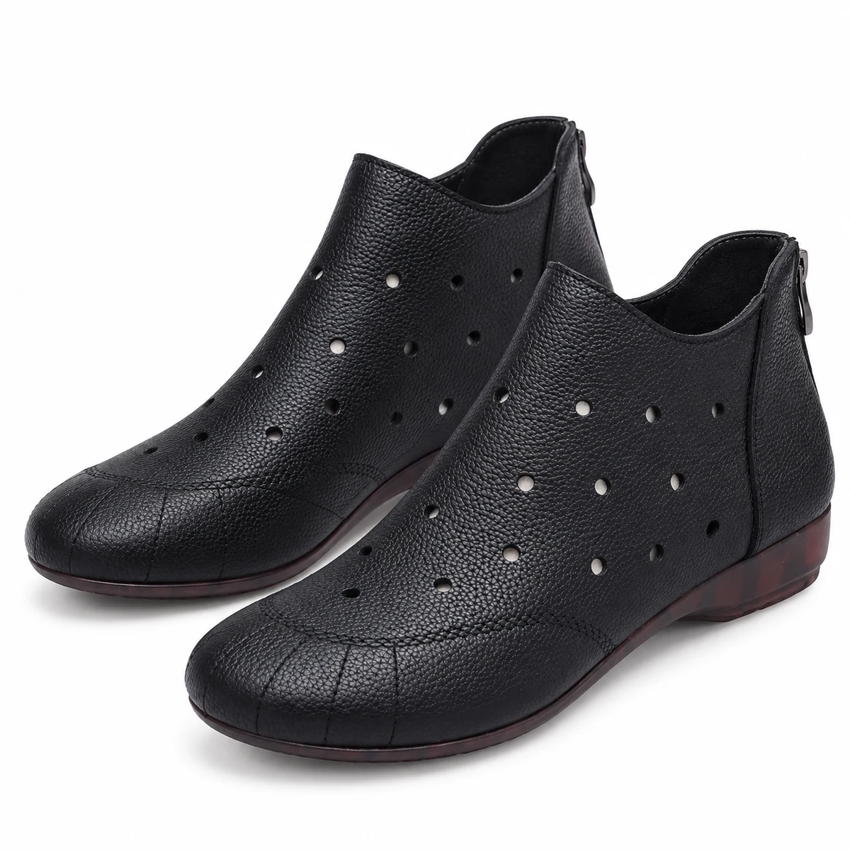 Chaussures femme intemporelles avec bottines noires ajourées et fermeture zip