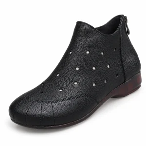 Bottines noires à fermeture zip pour femme avec silhouette élégante