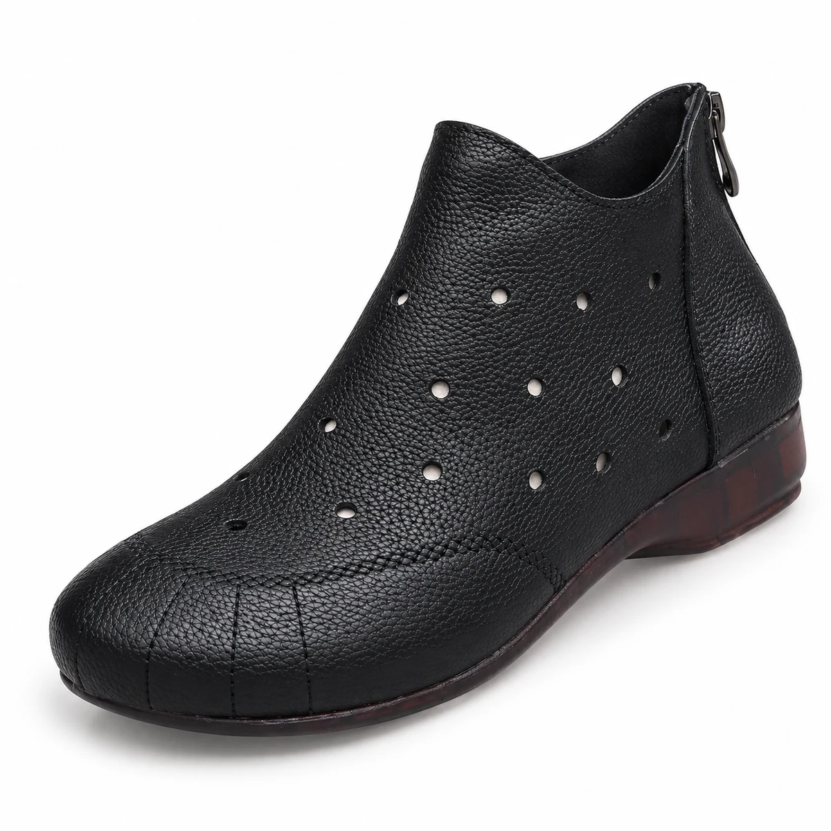 Bottines noires à fermeture zip pour femme avec silhouette élégante