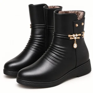 Bottines femme noires fourrées avec bride bijou et fermeture éclair élégante