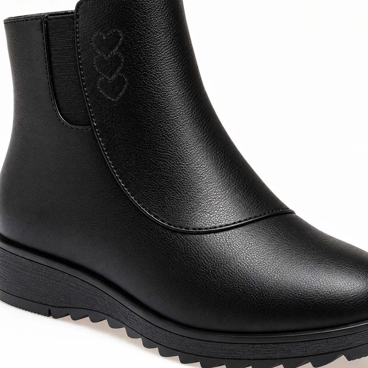 bottines femme noires fourrees a zip et semelle basse crantee details