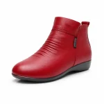 bottines femme rouges fourrees et compensees vue de trois quarts sur fond blanc 45072