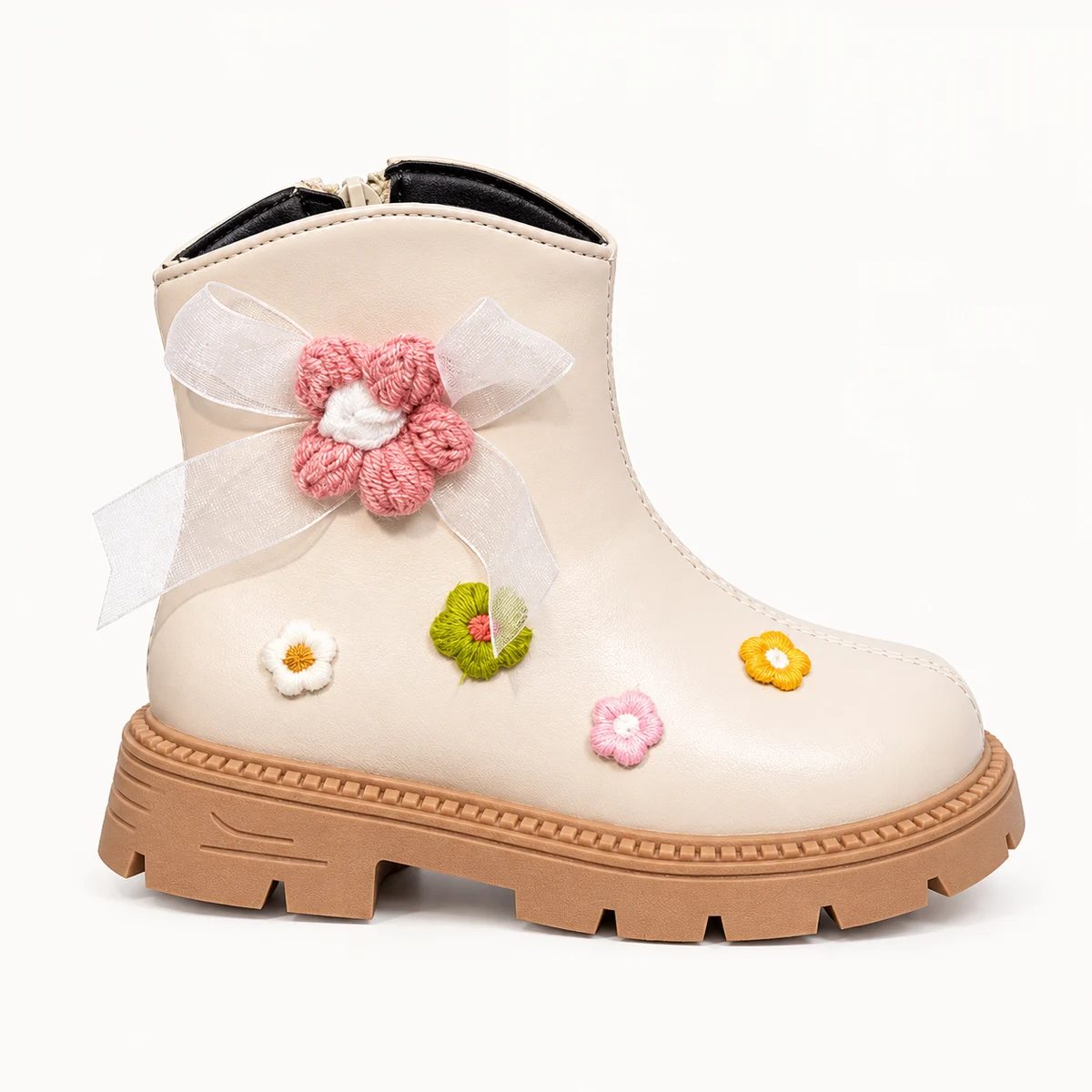 Bottines beiges pour enfant avec décoration florale et semelle crantée