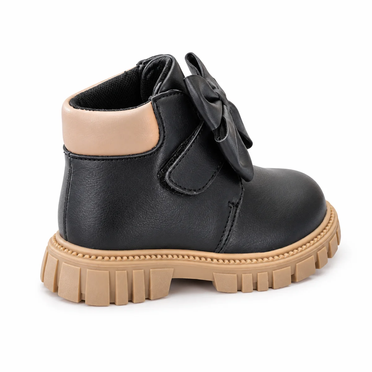 Détails des bottines en cuir noir avec nœud et semelle contrastée pour fille