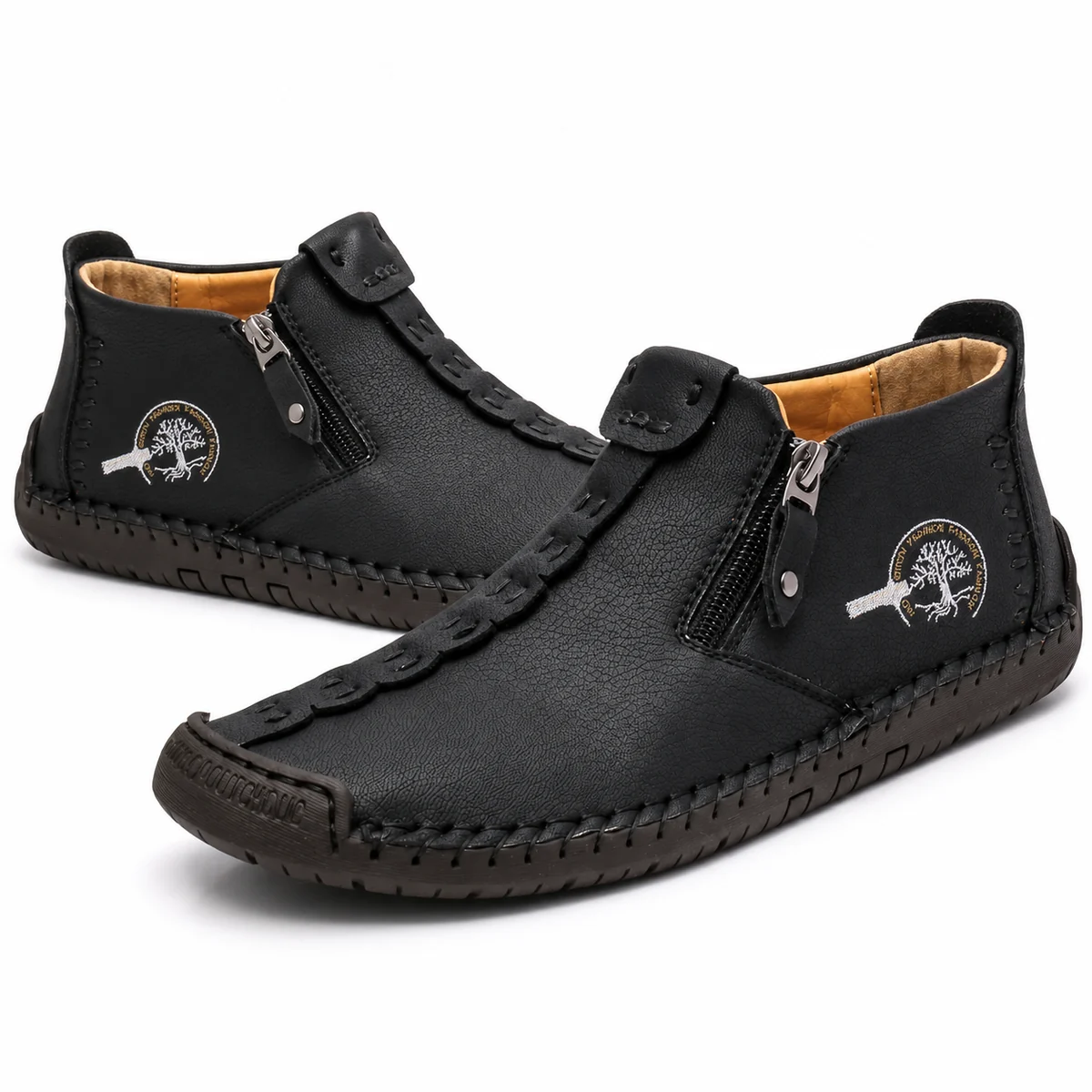 Chaussures homme en cuir noir avec zip sur le côté et coutures apparentes stylisées