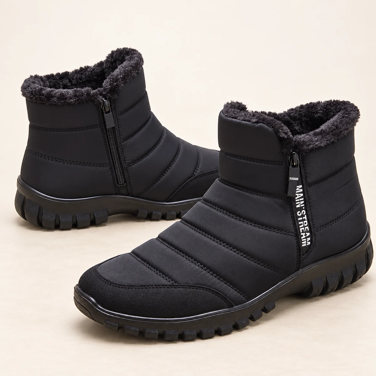 Vue latérale des bottines homme noires pour froid avec matelassage