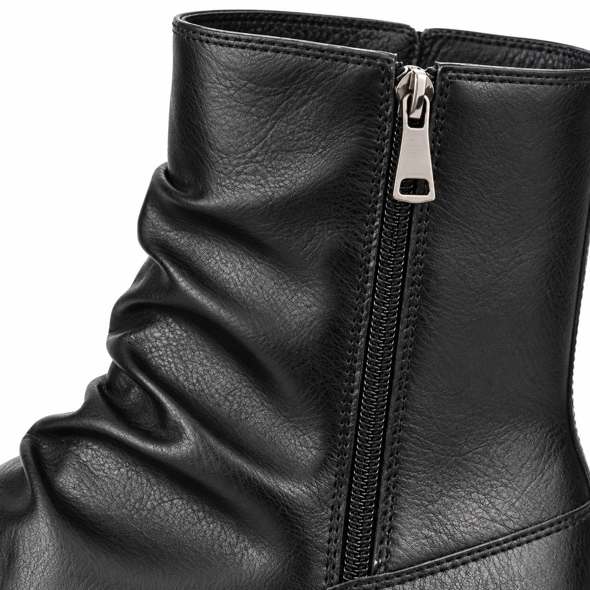 Profil des bottines homme noires à zip et bordure marron pour style casual