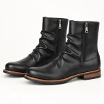 Bottines homme noires plissées avec zip et bordure marron vue de face
